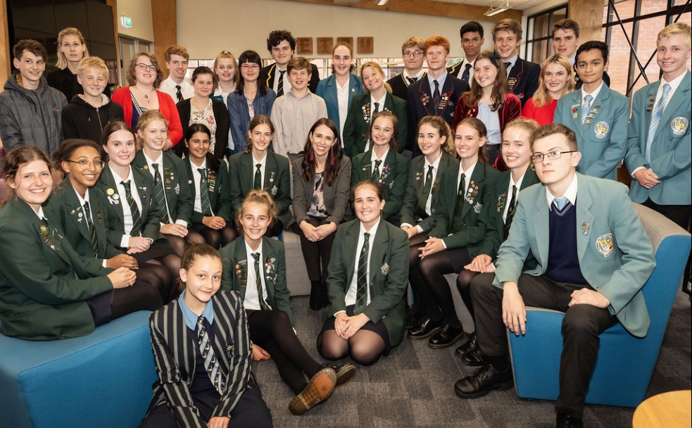 Jacinda with students.jpg